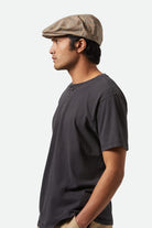 Unisex Vintage Reserve S/S Henley in the color Black Sol Wash - Men's Side View