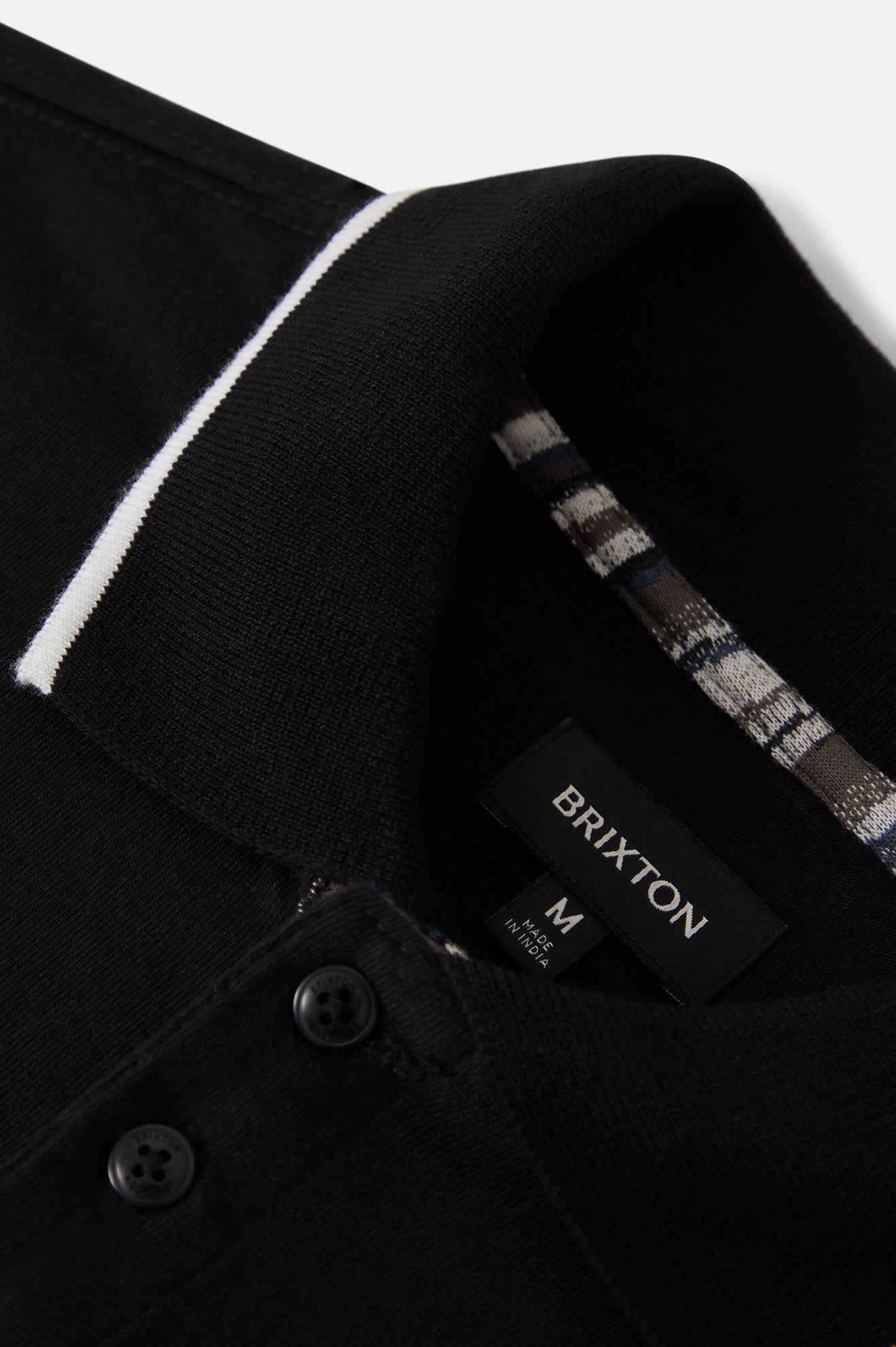 Men's Anton Short Sleeve Polo in the color Black - Additional Laydown image