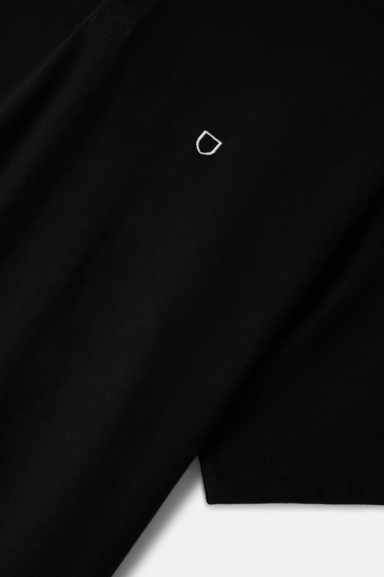 Men's Anton Short Sleeve Polo in the color Black - Additional Laydown image