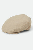 Unisex Hooligan Flat Cap in the color Khaki Stripe/Washed Black - Front Product Laydown Image