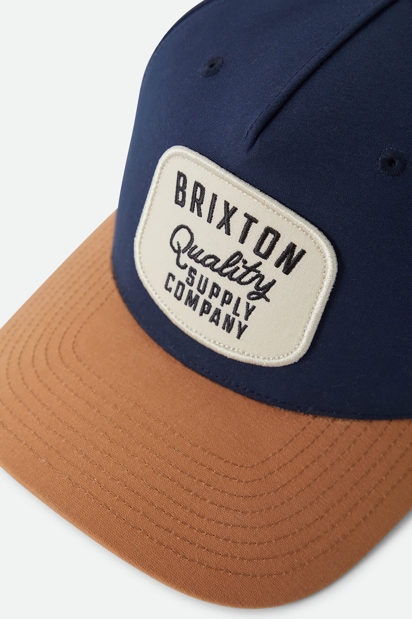 Unisex Hubal Snapback in the color Washed Navy/Dusted Ochre - Additional Laydown image