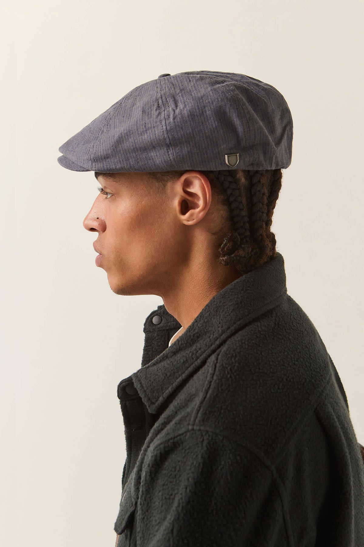 Unisex Brood Newsboy Cap in the color Indigo/Dark Sand - Men's Back View
