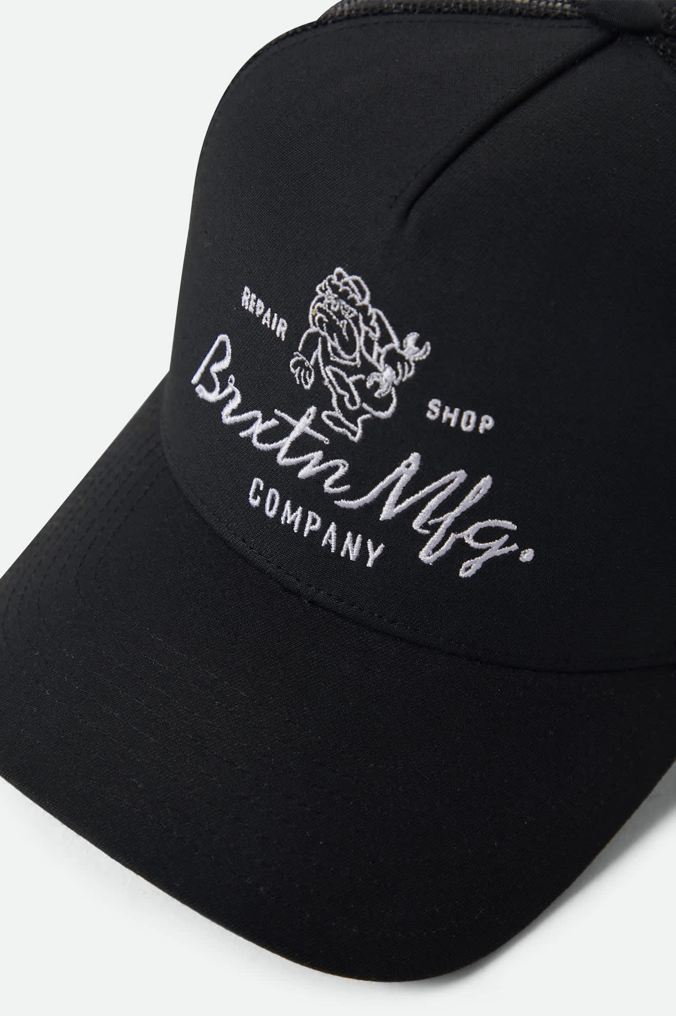 Unisex Tolman NetPlus Trucker Hat in the color Black/Black - Additional Laydown image