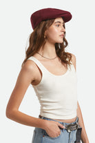 Unisex Brood Newsboy Cap in the color Port - Women's Side View