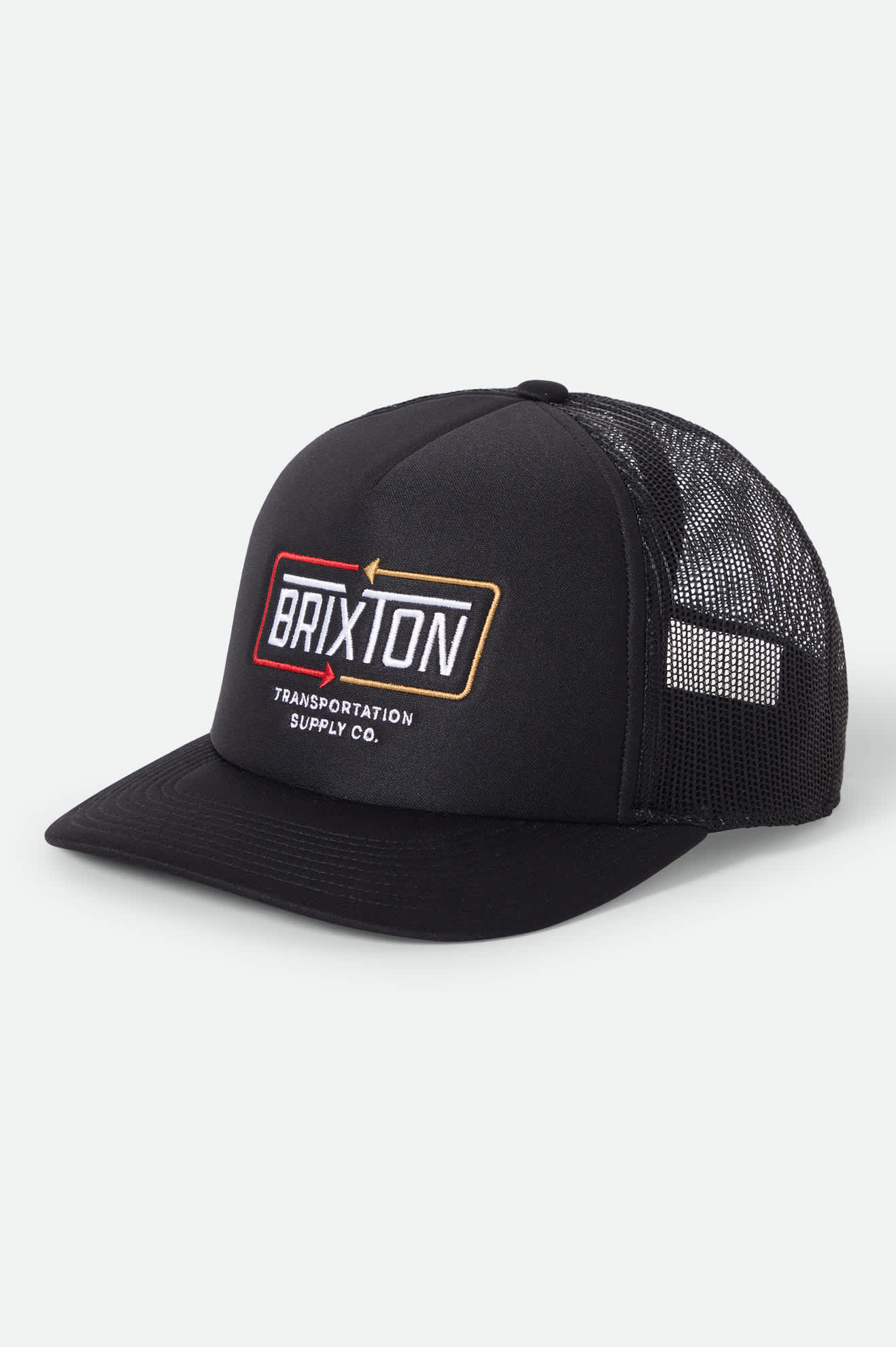 Unisex Caldwell Netplus Trucker Hat in the color Black/Black - Front Product Laydown Image