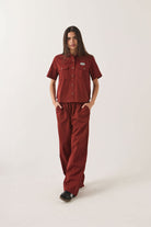 Women's Mechanics Women's Shirt in the color Dark Brick - Women's Front Fit Image