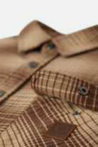 Men's Builders Bowery Stretch Water Resistant L/S Flannel in the color Pine Needle/Sunbaked - Additional Laydown image