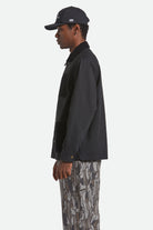 Men's Herringbone Lightweight Chore Coat in the color Black Herringbone - Men's Side View