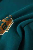 Men's Genuine Quality Hoodie in the color Night Sage - Additional Laydown image