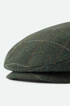 Unisex Hooligan Flat Cap in the color Moss/Orange - Additional Laydown image