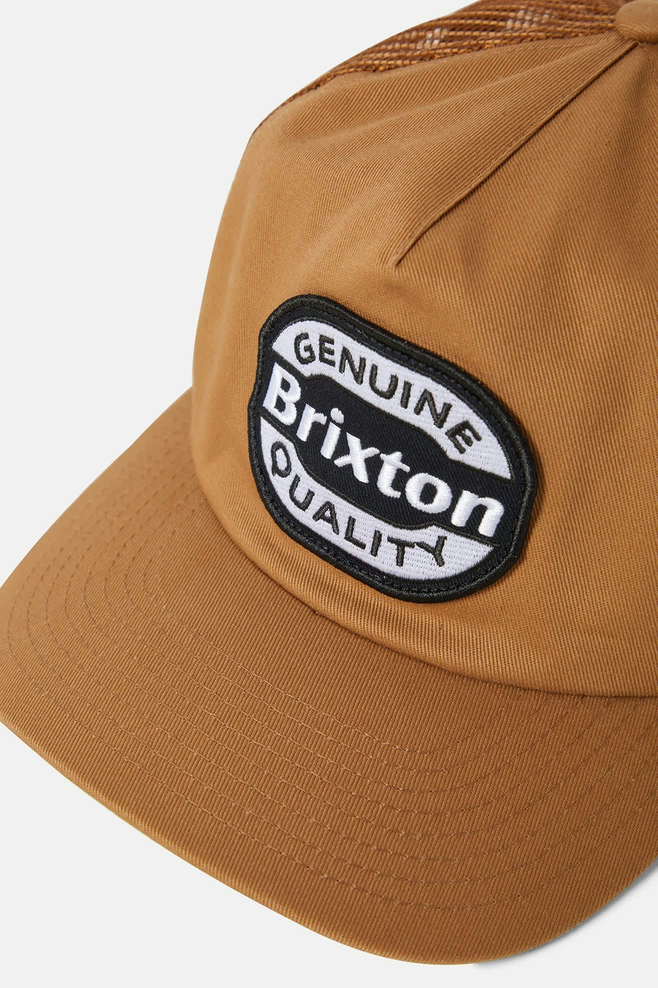 Unisex Keaton Netplus Trucker Hat in the color Washed Copper/Washed Copper - Additional Laydown image