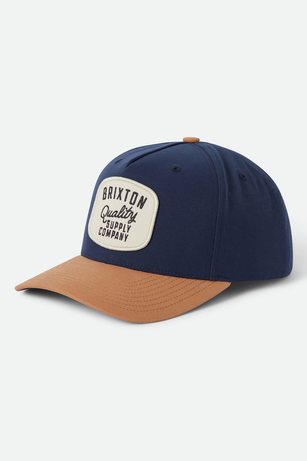 Unisex Hubal Snapback in the color Washed Navy/Dusted Ochre - Front Product Laydown Image