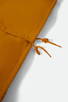 Men's Goodyear Slick Wind Breaker in the color Nugget Gold - Additional Laydown image