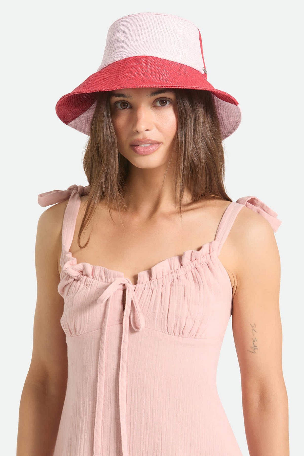 Women's Harmony Packable Bucket Hat in the color Silver Pink/Adrenaline Rush - Women's Front View