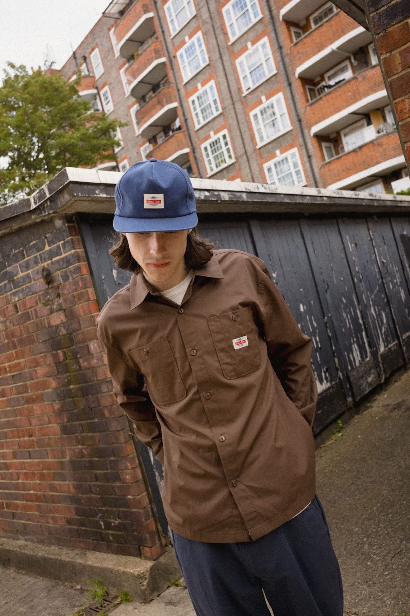 Unisex Trademark Adjustable Hat in the color Washed Navy - Men's Lifestyle 2.0