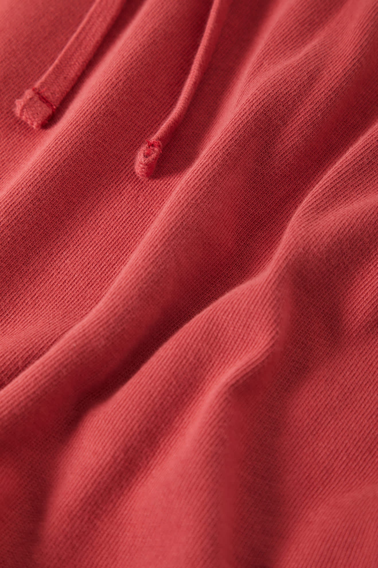 Women's Carefree Organic Garment Dye Lounge Skirt in the color Robust Red - Additional Laydown image