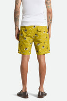 Men's Everyday Stretch Hybrid Short 7" in the color Texas Gold Lone Star - Men's Back View
