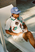 Men's CRU Print Relaxed S/S Shirt in the color Off White/Aquatic Green Floral - Men's Lifestyle image