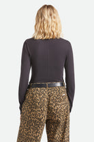 Women's Carefree Organic Garment Dye Slim L/S T-Shirt in the color Black - Women's Back View