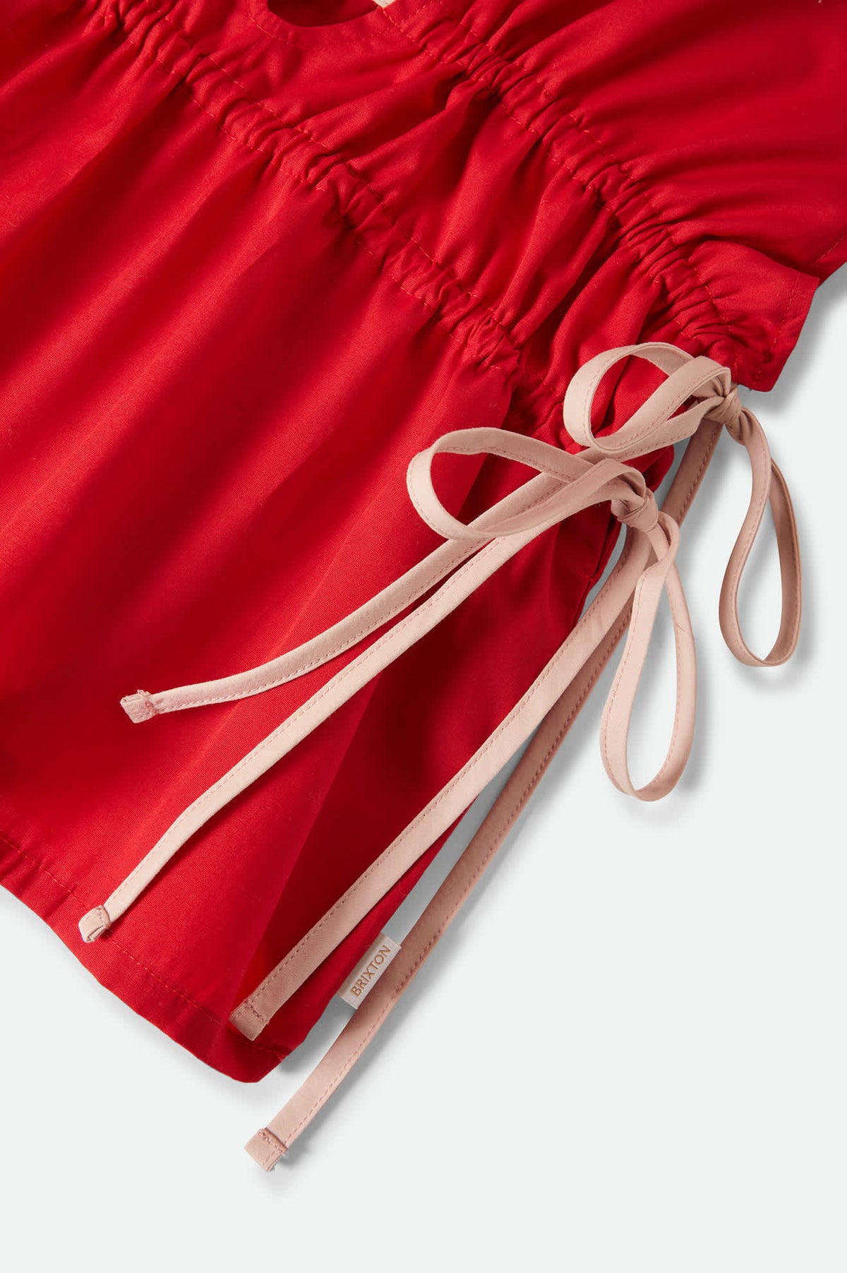 Women's The Bells Top in the color Adrenaline Rush - Additional Laydown image