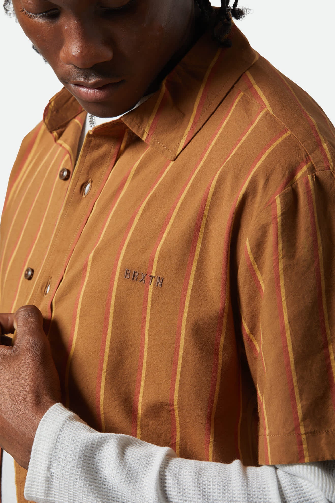 Men's CRU Stripe Relaxed S/S Shirt in the color Washed Copper/Burnt Red/Sunset - Additional Fit View