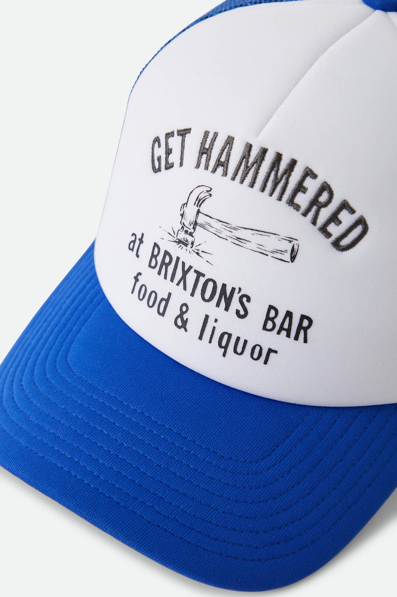 Unisex Metal Trucker Hat in the color Off White/Electric Indigo - Additional Laydown image