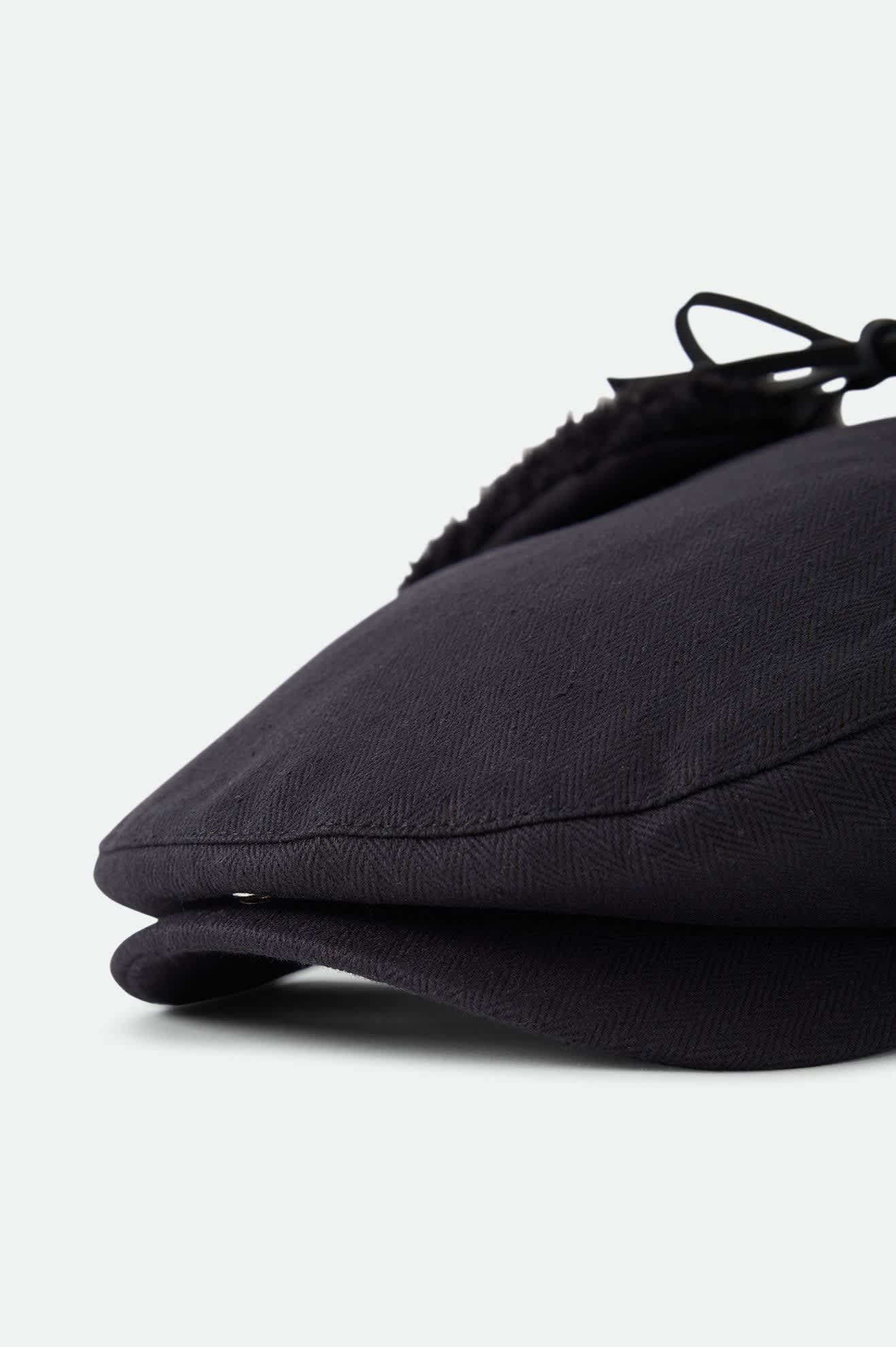 Unisex Barrel Earflap Snap Cap in the color Black/Black - Additional Laydown image