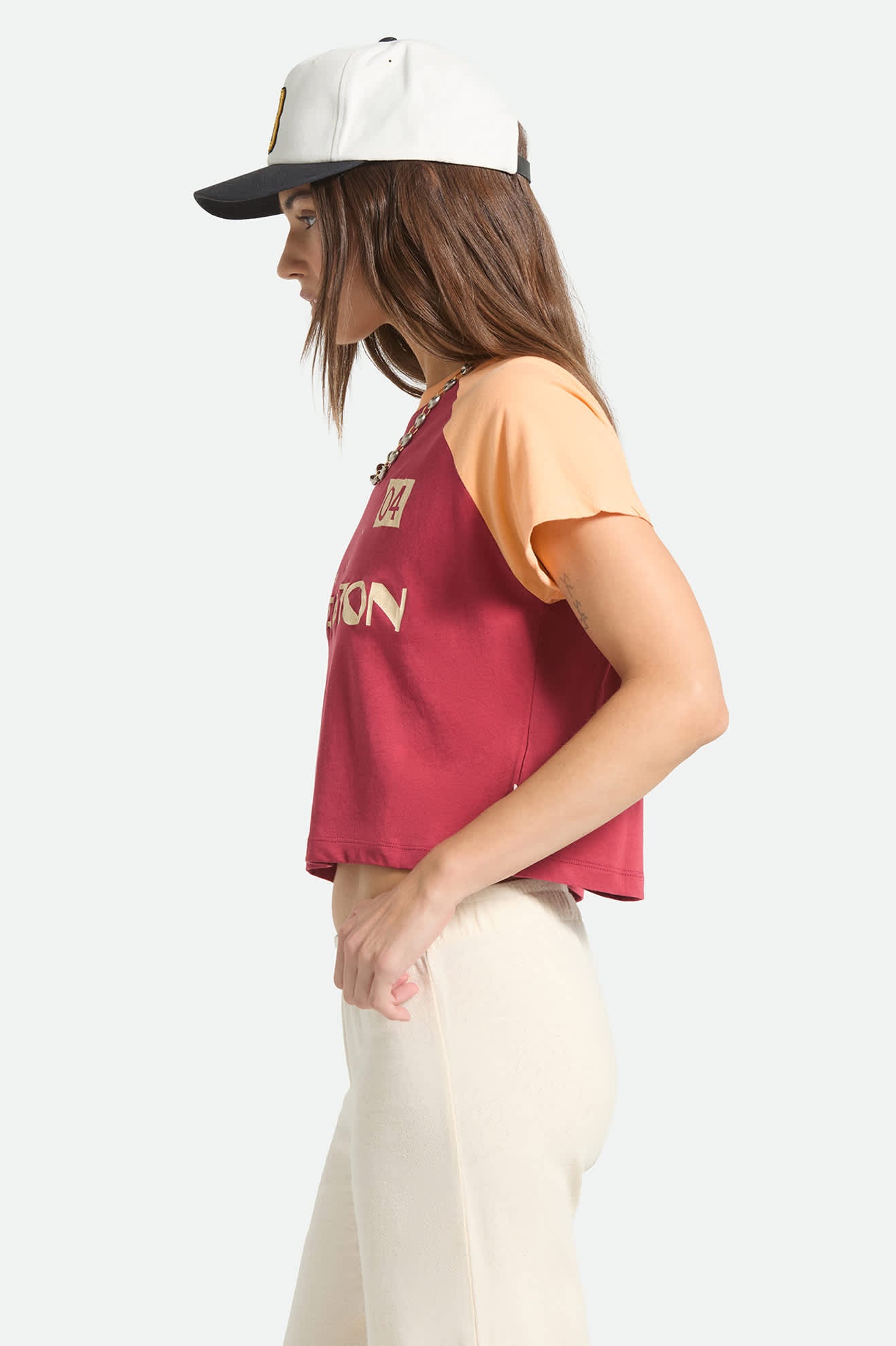 Women's Swallow Sky Cropped Raglan in the color Robust Red/Peach Cobbler - Women's Side View